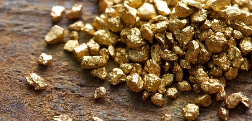bigstock-a-mound-of-gold-on-a-old-woode-37017502-1080x675